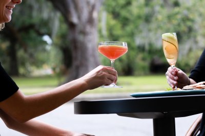 Ladies Drinking Outdoors by City Park